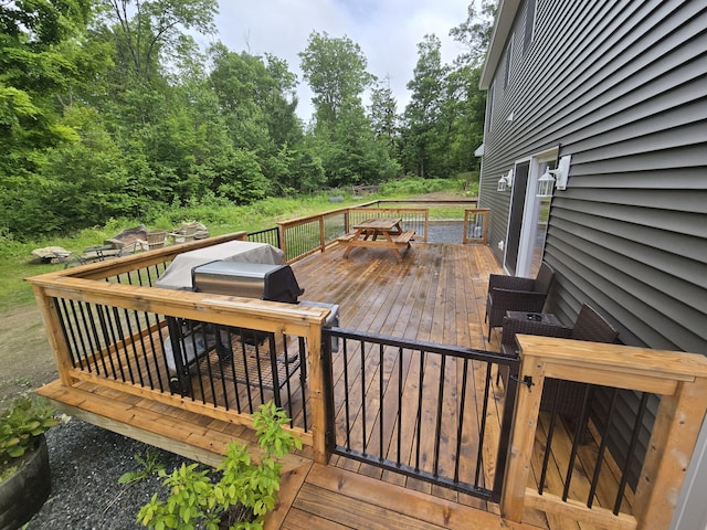 1083 N Rd, Newburgh, ME 04444 - wooden terrace featuring outdoor dining area