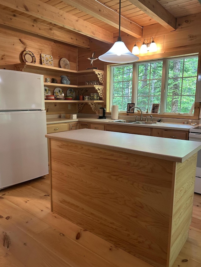 704 Sawyers Mills Rd, Starks, ME 04911 - kitchen featuring white appliances, light countertops, a wood ceiling with exposed beams, light wood finished floors, and wooden walls