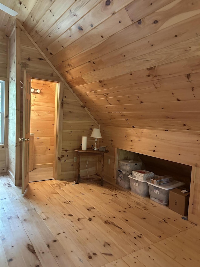 704 Sawyers Mills Rd, Starks, ME 04911 - additional living space featuring lofted ceiling, wooden ceiling, wood walls, and hardwood / wood-style flooring