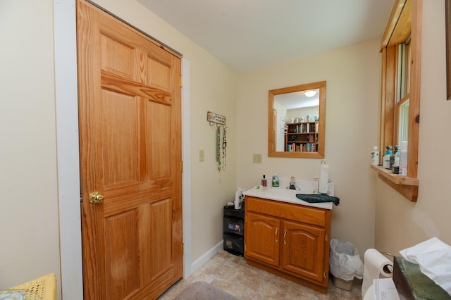 365 Waterville Rd, Skowhegan, ME 04976 - bathroom with vanity and baseboards