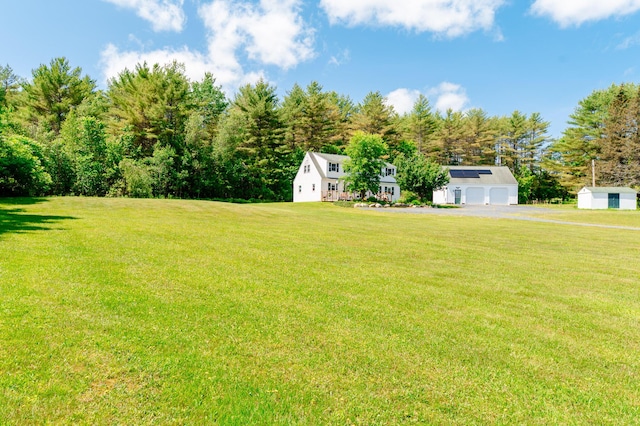 365 Waterville Rd, Skowhegan, ME 04976 - view of grassy yard featuring an outbuilding and a garage