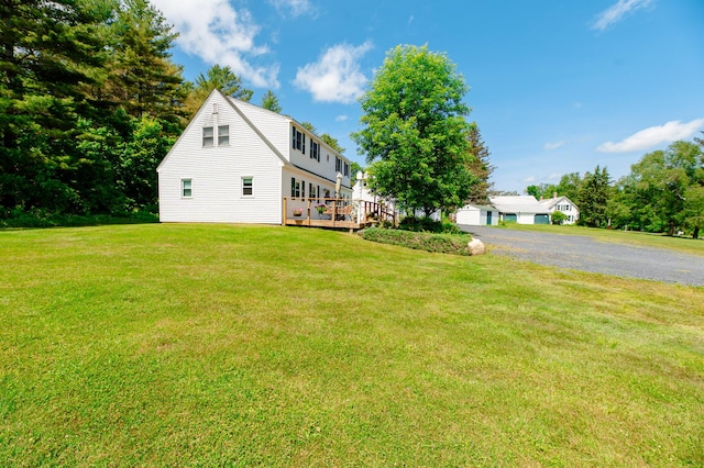 365 Waterville Rd, Skowhegan, ME 04976 - view of home's exterior featuring a wooden deck and a lawn
