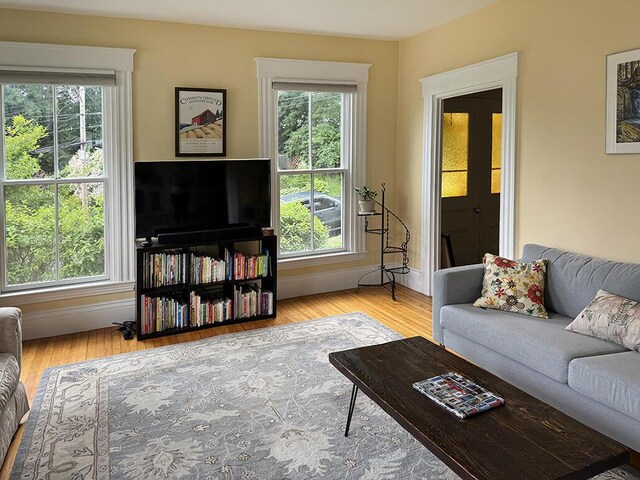19 Union St, Hallowell, ME 04347 - living area featuring wood finished floors and baseboards