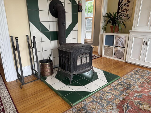 19 Union St, Hallowell, ME 04347 - detailed view of a wood stove and wood finished floors