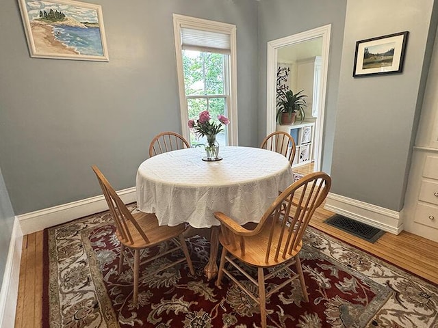 19 Union St, Hallowell, ME 04347 - dining area with baseboards and wood finished floors