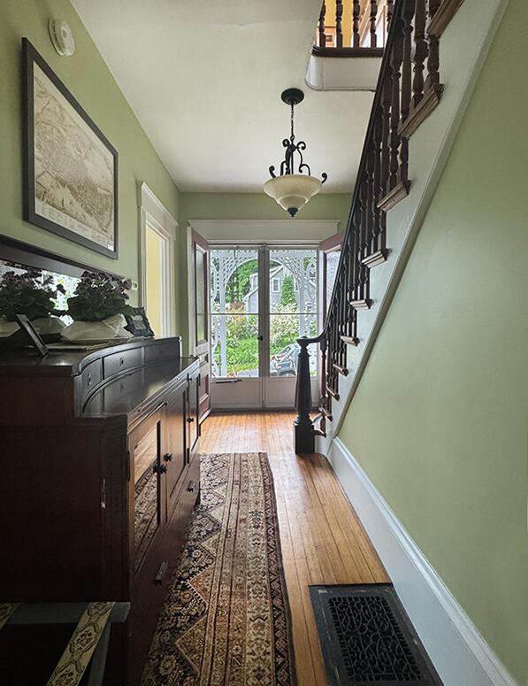 19 Union St, Hallowell, ME 04347 - entrance foyer featuring french doors, stairs, and light wood-type flooring