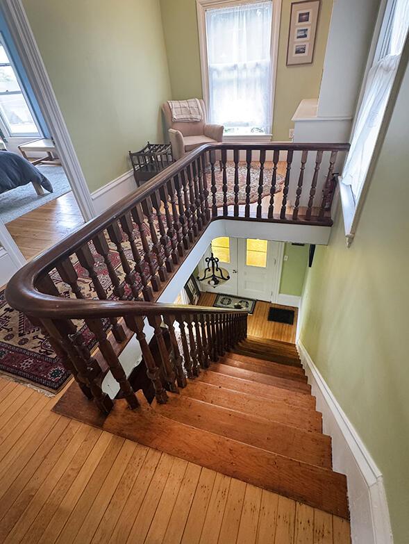 19 Union St, Hallowell, ME 04347 - staircase with wood-type flooring and plenty of natural light