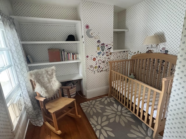 19 Union St, Hallowell, ME 04347 - bedroom with wallpapered walls and wood finished floors