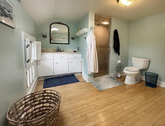 19 Union St, Hallowell, ME 04347 - full bath with vanity, a stall shower, wood finished floors, and lofted ceiling