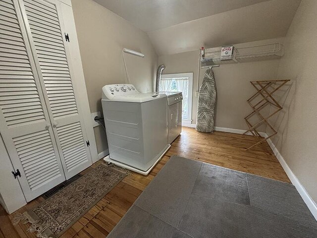 19 Union St, Hallowell, ME 04347 - laundry room featuring washer and dryer and wood finished floors
