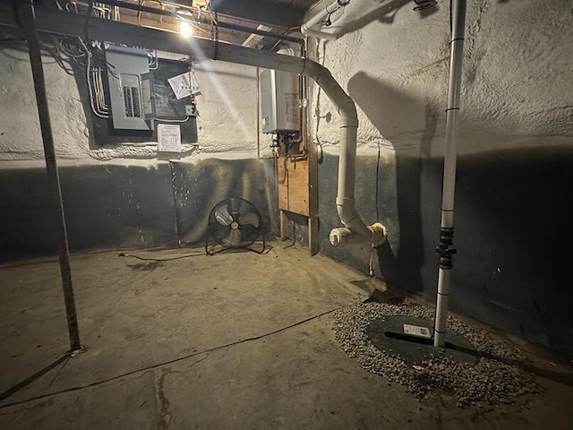 19 Union St, Hallowell, ME 04347 - unfinished basement featuring water heater and electric panel
