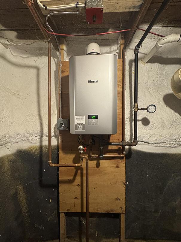 19 Union St, Hallowell, ME 04347 - utility room featuring tankless water heater