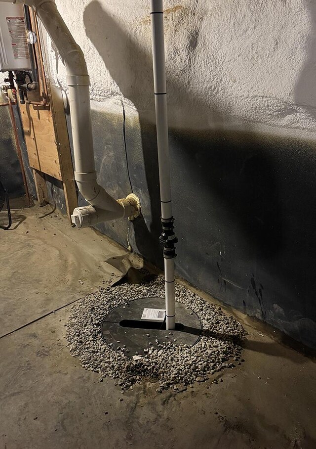 19 Union St, Hallowell, ME 04347 - basement view of gas water heater