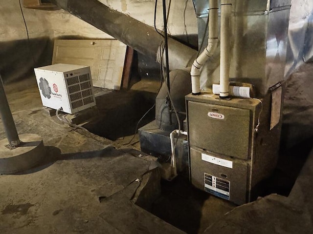 19 Union St, Hallowell, ME 04347 - utility room with heating unit