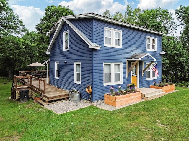 171 Bassett Rd, Winslow, ME 04901 - view of front facade featuring a deck and a front lawn