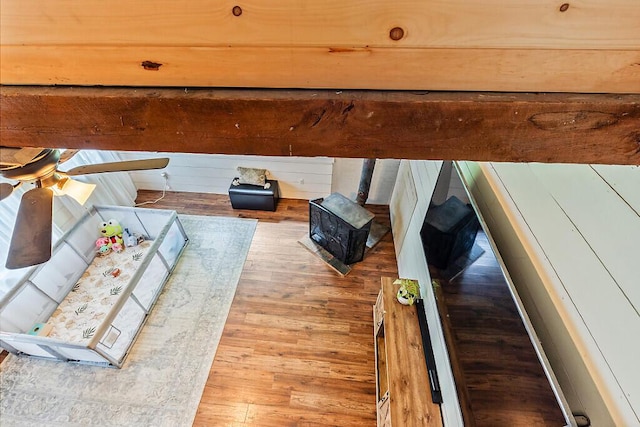171 Bassett Rd, Winslow, ME 04901 - interior space with a wood stove and wood finished floors