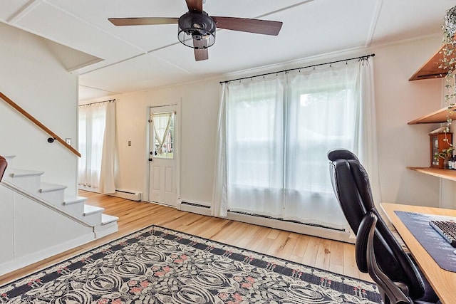 171 Bassett Rd, Winslow, ME 04901 - office space with light wood finished floors, a ceiling fan, and a baseboard radiator