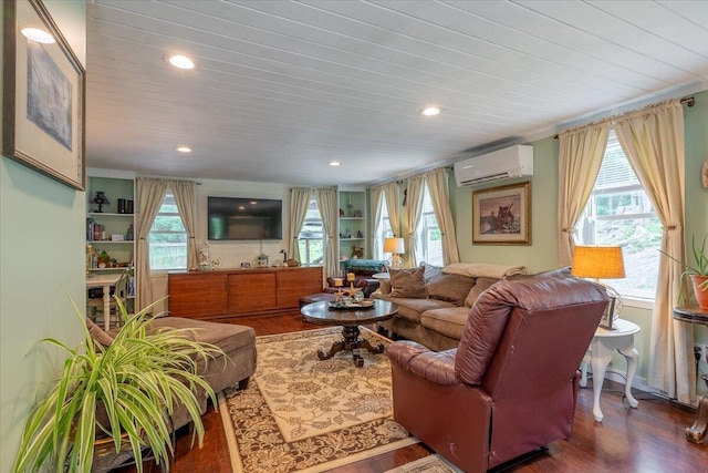 25 Pine View Ridge Rd, Boothbay, ME 04537 - living room featuring a wall unit AC, wood finished floors, recessed lighting, and wooden ceiling