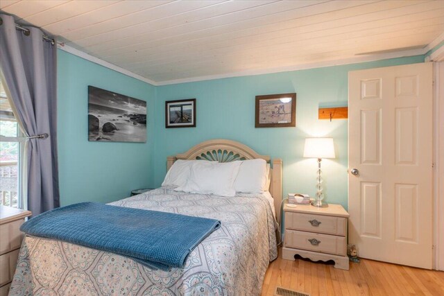 25 Pine View Ridge Rd, Boothbay, ME 04537 - bedroom with wood finished floors and crown molding