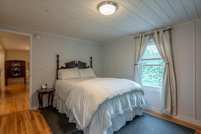 25 Pine View Ridge Rd, Boothbay, ME 04537 - bedroom with light wood finished floors, wooden ceiling, and ornamental molding