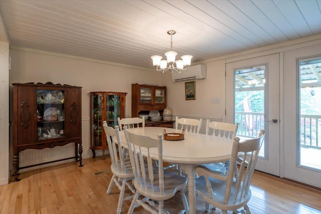 25 Pine View Ridge Rd, Boothbay, ME 04537 - dining area featuring a wall mounted air conditioner, wooden ceiling, plenty of natural light, a chandelier, and french doors