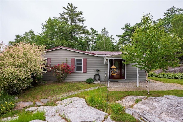 25 Pine View Ridge Rd, Boothbay, ME 04537 - single story home featuring a patio area