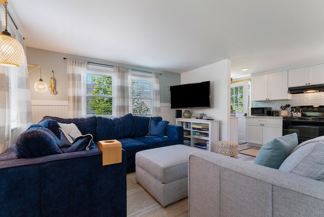 11 Farmhouse Way Unit 11, Ogunquit, ME 03907 - living area with a wainscoted wall