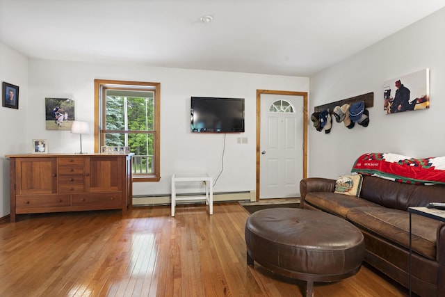 14 Moody Pond Rd, Windsor, ME 04363 - living room with baseboard heating and light wood-style floors
