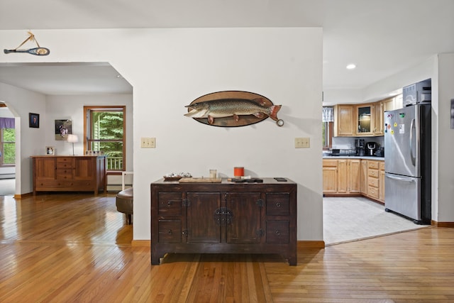 14 Moody Pond Rd, Windsor, ME 04363 - hallway featuring arched walkways, healthy amount of natural light, light wood-type flooring, and recessed lighting