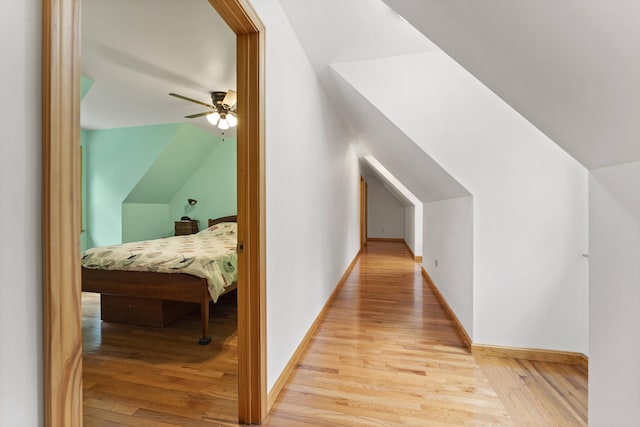 14 Moody Pond Rd, Windsor, ME 04363 - hallway with light wood-type flooring and vaulted ceiling