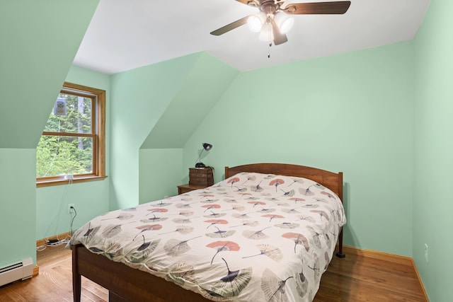 14 Moody Pond Rd, Windsor, ME 04363 - bedroom with a baseboard radiator, wood finished floors, and a ceiling fan