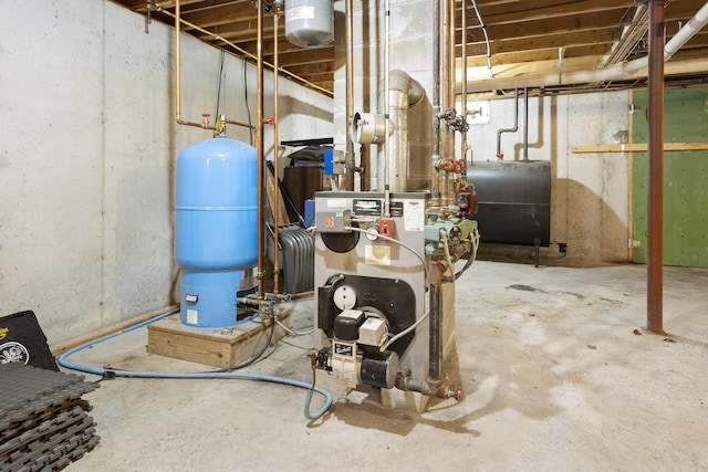 14 Moody Pond Rd, Windsor, ME 04363 - utility room featuring oil tank and a heating unit