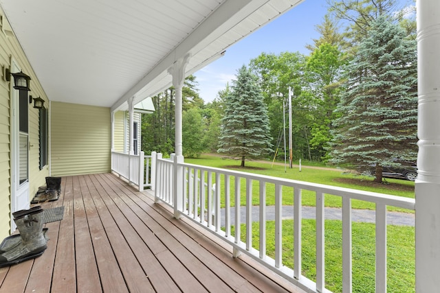 14 Moody Pond Rd, Windsor, ME 04363 - porch with a yard and view of wooded area