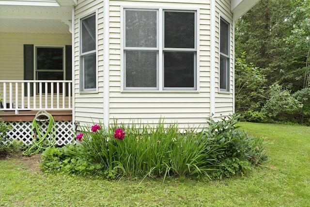 14 Moody Pond Rd, Windsor, ME 04363 - view of side of property with a lawn and a porch