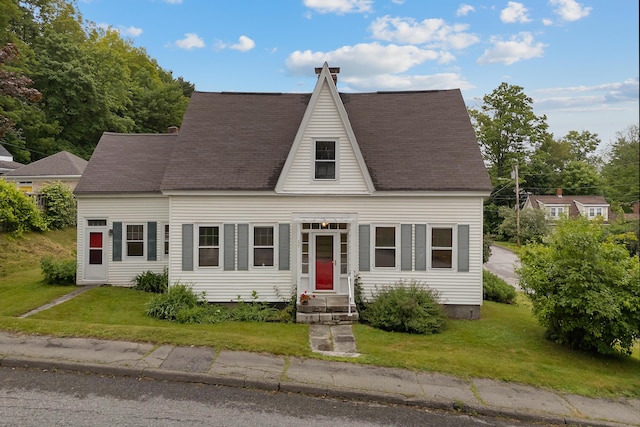 37 Central St, Hallowell, ME 04347 - cape cod-style house featuring a front lawn and a shingled roof