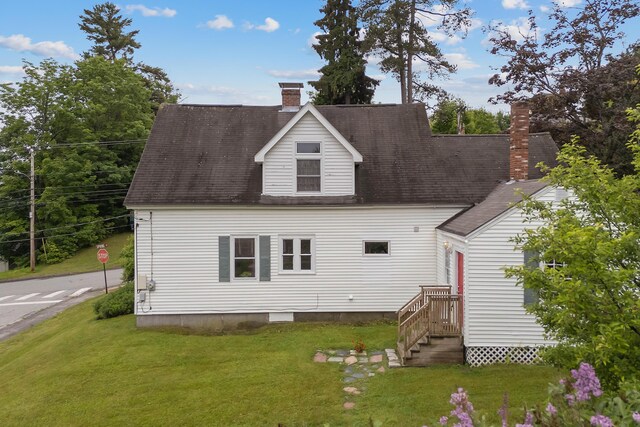 37 Central St, Hallowell, ME 04347 - back of property with a chimney, a yard, and roof with shingles