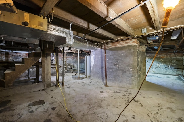 37 Central St, Hallowell, ME 04347 - unfinished below grade area featuring stairway and water heater