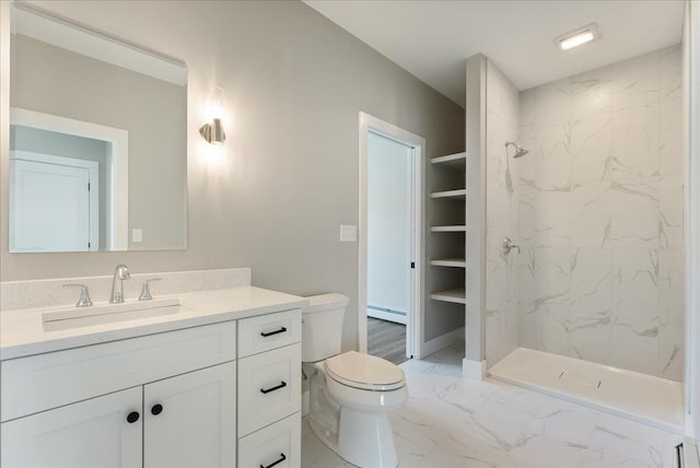 50 Ocean Park Rd Unit 102, Saco, ME 04072 - bathroom with vanity, a marble finish shower, marble look tiles, and a baseboard heating unit