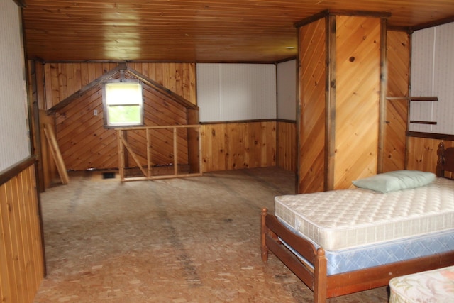 1100 Shin Pond Rd, Mount Chase, ME 04765 - bedroom featuring wood walls and wood ceiling