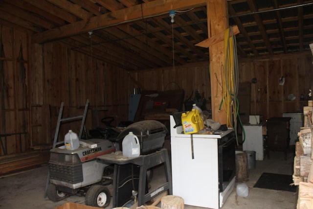1100 Shin Pond Rd, Mount Chase, ME 04765 - miscellaneous room featuring concrete floors, a garage, and washer / dryer