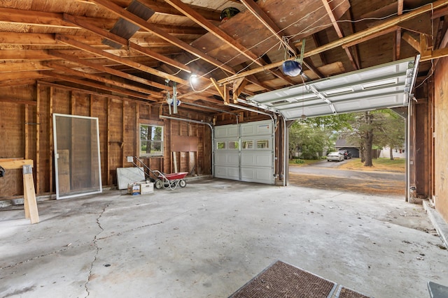 28 Colony Rd, Augusta, ME 04330 - garage featuring a garage door opener