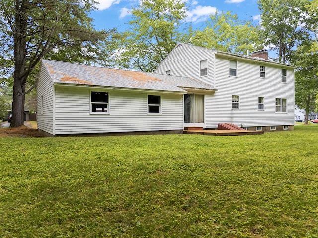 28 Colony Rd, Augusta, ME 04330 - rear view of property with a chimney, a lawn, and roof with shingles