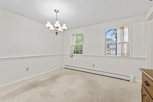 28 Colony Rd, Augusta, ME 04330 - carpeted spare room with a baseboard radiator and a chandelier