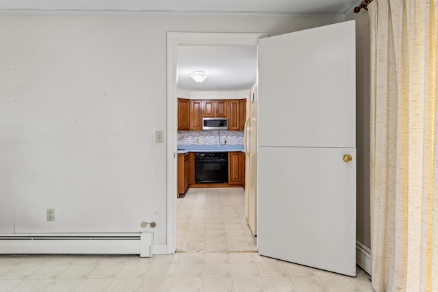 28 Colony Rd, Augusta, ME 04330 - hall featuring baseboard heating and light flooring