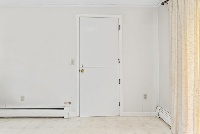 28 Colony Rd, Augusta, ME 04330 - empty room featuring a baseboard radiator and light flooring