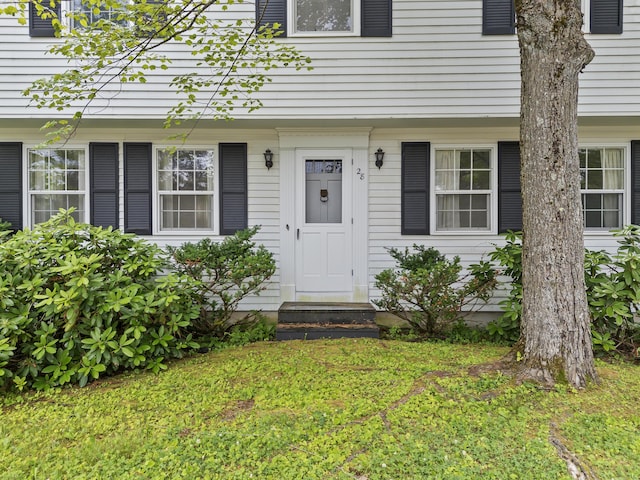 28 Colony Rd, Augusta, ME 04330 - property entrance featuring a yard