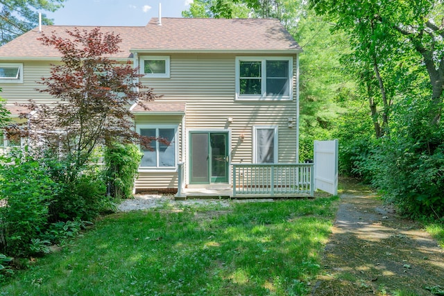 459 Allen Ave Unit 5, Portland, ME 04103 - rear view of property with roof with shingles, a lawn, and a deck