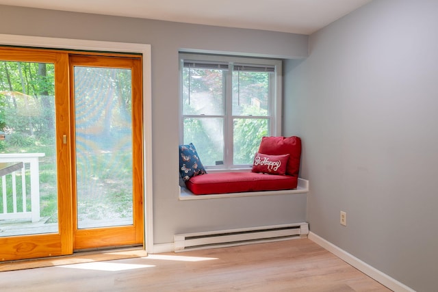 459 Allen Ave Unit 5, Portland, ME 04103 - doorway to outside featuring a baseboard radiator and wood finished floors