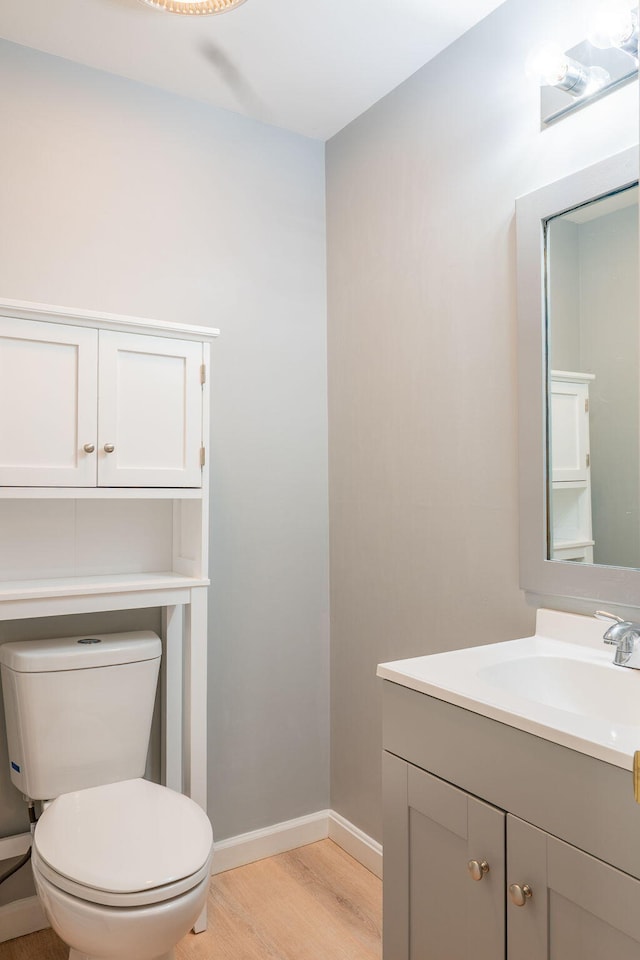 459 Allen Ave Unit 5, Portland, ME 04103 - half bath featuring vanity and wood finished floors