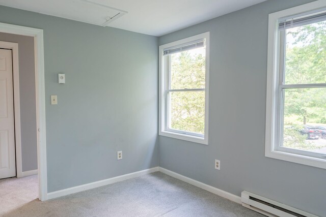 459 Allen Ave Unit 5, Portland, ME 04103 - unfurnished room featuring baseboard heating, attic access, light carpet, and plenty of natural light
